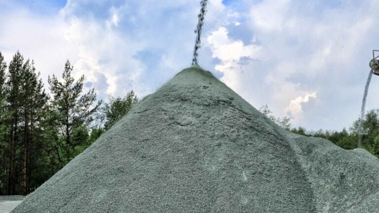 Stone powder stockpile being loaded