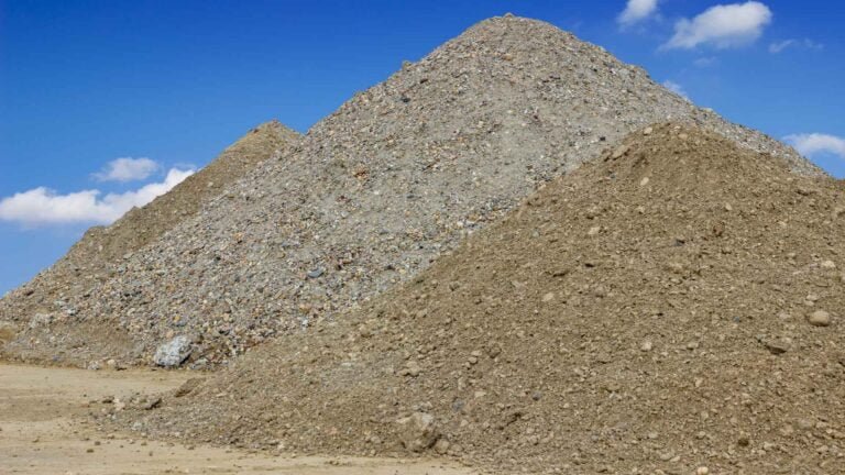 Stockpiles of crushed sand and stone powder