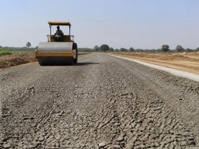 GSB granular sub-base being compacted on a road under construction